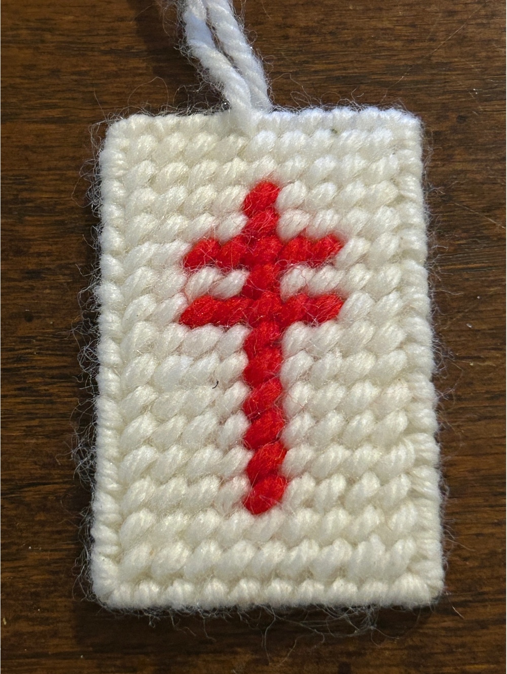 Handmade White Woolen Ornament with Red Cross Stitch